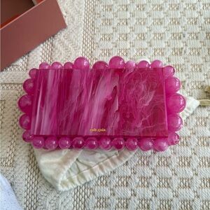 Cult Gaia EOS pink clutch